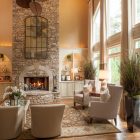 Traditional Living Interior Sensational Traditional Living Room Design Interior Completed With Stone Fireplace Design And Beige Sofa Furniture Ideas Fireplace Classic Yet Contemporary Stone Fireplace For Wonderful Family Rooms