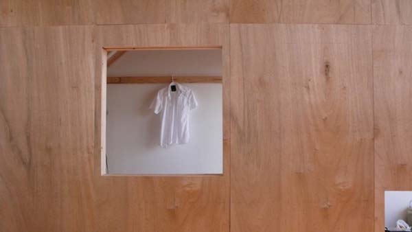 Frame Installed Divider Stunning Frame Installed On Wooden Divider To Display Other Side Of Cabin Loft In Brooklyn Room With White Wall Decoration Unique Tiny Cabin With Minimalist Staircase That Maximize Space