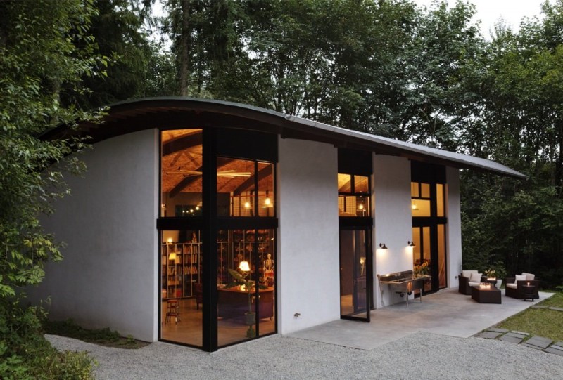 Night View Nautilus Stunning Night View Of The Nautilus Studio With White Wall And Wide Glass Walls Under The Curve Roof Decoration  Small And Beautiful Home Studio Designed For A Textile Artist