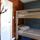 Cream Wood With Stylish Cream Wood Bunk Bed With Innovative Dark Tree Shaped Used Coat Racks Sleek Hardwood Wall Panel With Vintage White Door Decoration Chic And Classy Coat Racks Brimming With Elegant Interior Decorations