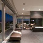 Interiors Such Long Stylish Interiors Such As A Long Black Chair Beside The Windows To Decorate The Luxury Home In LA Architecture Luxurious And Modern Concrete Home With Long Swimming Pools