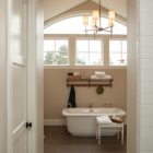 Bathroom With Above Traditional Bathroom With Classy Chandelier Above White Porcelain Bathtub French Window Vintage White Door Rustic Wood Wall Shelf Decoration Chic And Classy Coat Racks Brimming With Elegant Interior Decorations