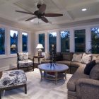 Living Room Many Traditional Living Room Featured With Many Windows To Brighten Brown Curved Sectional Sofa And Patterned Chairs Decoration Comfortable Curved Sectional Sofas For Small Living Rooms