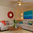 Seating Space With Tropical Seating Space Idea Decorated With Blue Sea Painting And Floral Mirror Above Light Sectional Sleeper Sofa Decoration Savvy Sectional Sleeper Sofa As Cozy Interior Furniture Sets (+14 New Images)