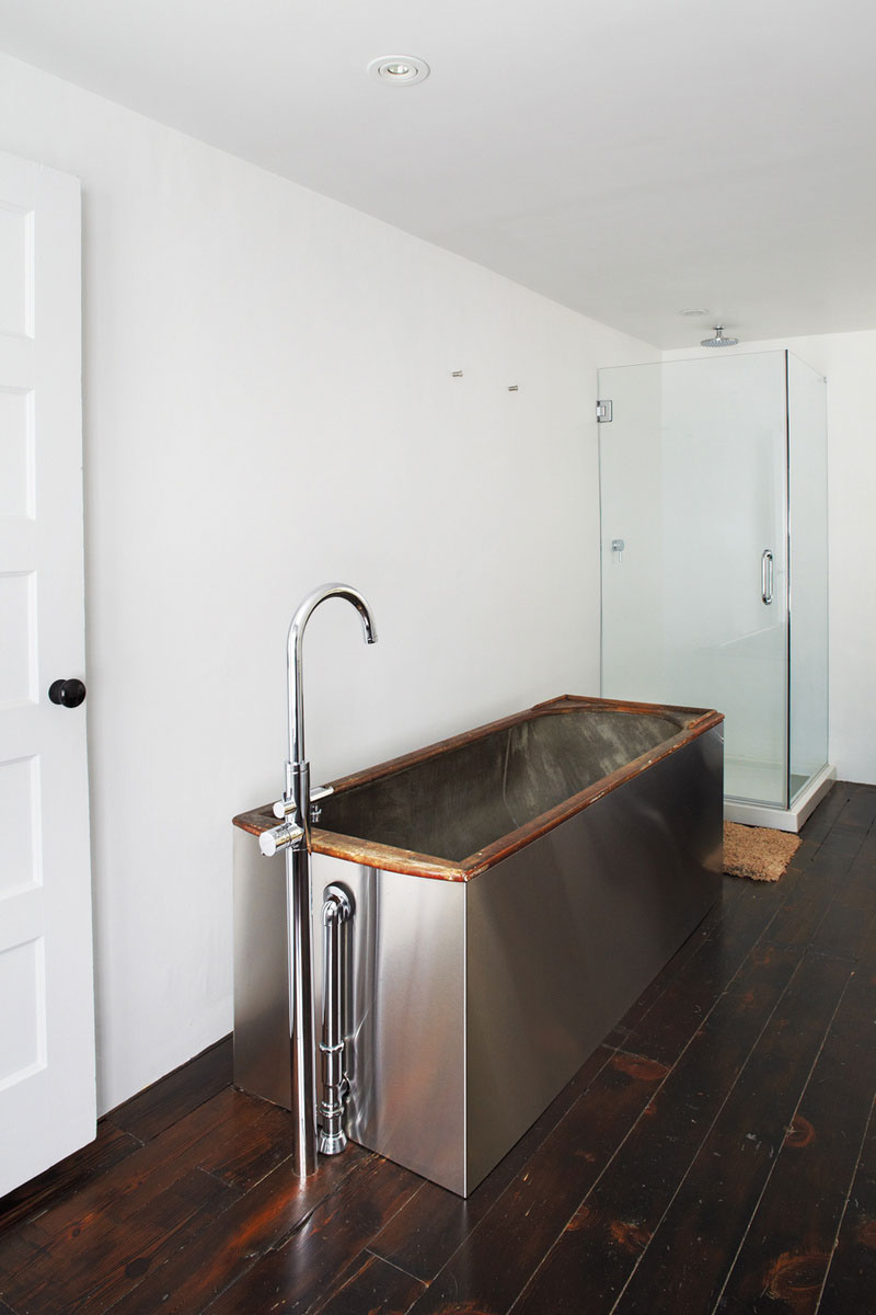 Metal Tub Floating Unusual Metal Tub In The Floating Farmhouse Bathroom With Glossy Faucet And White Wall On Hardwood Floor Dream Homes Bewitching Modern Farmhouse With White Color And Rustic Appearance