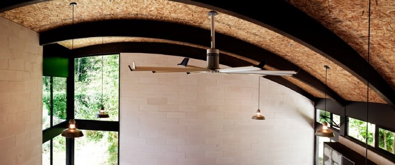 Propeller Inside Studio Wide Propeller Inside The Nautilus Studio With Brown Ceiling And White Stone Wall Near Glass Walls Dream Homes Small And Beautiful Home Studio Designed For A Textile Artist