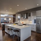 White Gray The Adorable White Gray Cabinets In The Kitchen With White Island And Dark Stools Installed In Simple Shift Top House Dream Homes Contemporary Three-Level Home With Stylish And Dramatic Grey Furniture