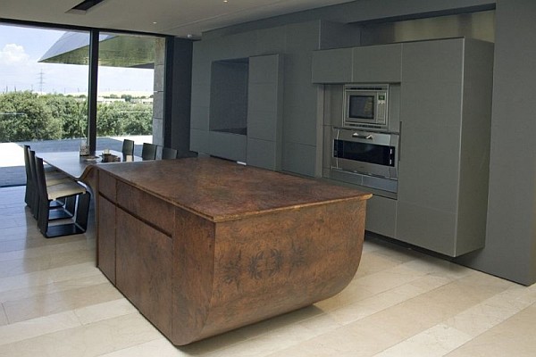 Nuance Reflected Kitchen Alarming Nuance Reflected In Stylish Kitchen With Brown Wooden Kitchen Island Grey Prefab Kitchen Appliances On Brown Wooden Floor Dream Homes Spanish Home Design With Futuristic And Elegant Cantilevered Decorations