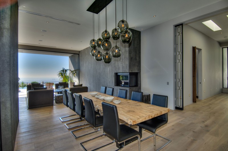 Dark Glass Above Amazing Dark Glass Pendant Lamp Above Wooden Striped Dining Table With Spectacular Views Over Los Angeles Furnished Black Decorative Chairs Dream Homes  Fascinating Contemporary House With Spectacular City Scenery