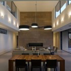 Skyline House Pendant Amazing Skyline House Interior Dark Pendant Light Above Wood Dining Table And Dark Chairs Grey Sofa Modern Gas Fireplace Dream Homes Affordable Modern Prefabricated Home With Concrete And Glass Structures