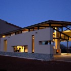 Building Design Residence Amusing Building Design Of Areopagus Residence With White Colored Wall Made From Concrete And Bright Yellow Lighting From Inside The House Dream Homes Stunning Hill House Design With Sophisticated Lighting In Costa Rica