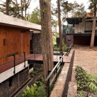 Front Yard Corallo Amusing Front Yard Design Of Corallo House With Grey Wall Made From Concrete And Dark Brown Wall Made From Wooden Material Dream Homes Exquisite Modern Treehouse With Stunning Cantilevered Roof