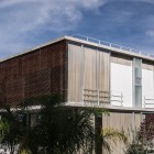 Wooden Striped The Amusing Wooden Striped Drapes On The Front Yard Of Second Level In Casa ER2 Residence Completed With Many Gray Wooden Glass Windows Dream Homes Spectacular Home Exterior With Unique Outdoor Wall Decorations