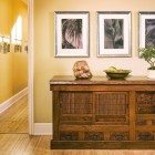 Wooden Console Hallway Antique Wooden Console Table At Hallway Inside The Modern Residence With Wooden Floor Decorated Some Wall Arts Decoration Wonderful Traditional Interior Design For Unique Modern Residence