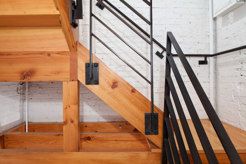 Details In Residence Appealing Details In The Artist Residence Staircase With Iron Handrail And Wooden Footings Near Brick Wall Decoration Elegant Home Decorated With Artistic And Contemporary Living Spaces