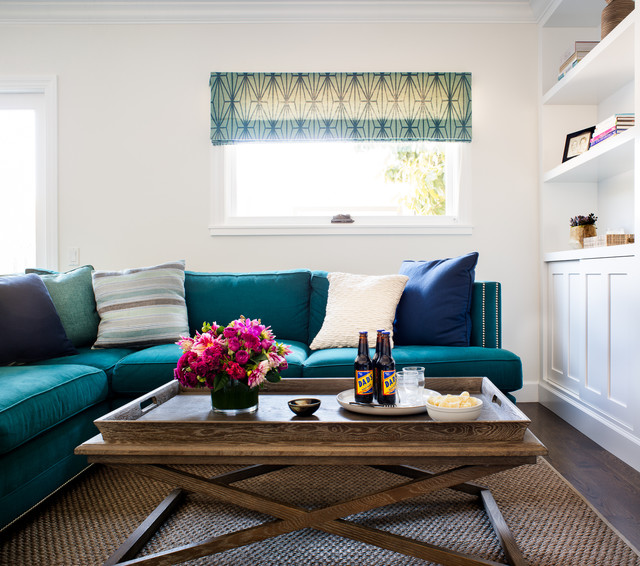 Living Room Blue Appealing Living Room Design Applied Blue Sectional Sofa And Wooden Coffee Table Decorated With Vase And Bottles Furniture Beautiful Blue Sectional Sofas To Making A Cozy And Comfortable Interiors