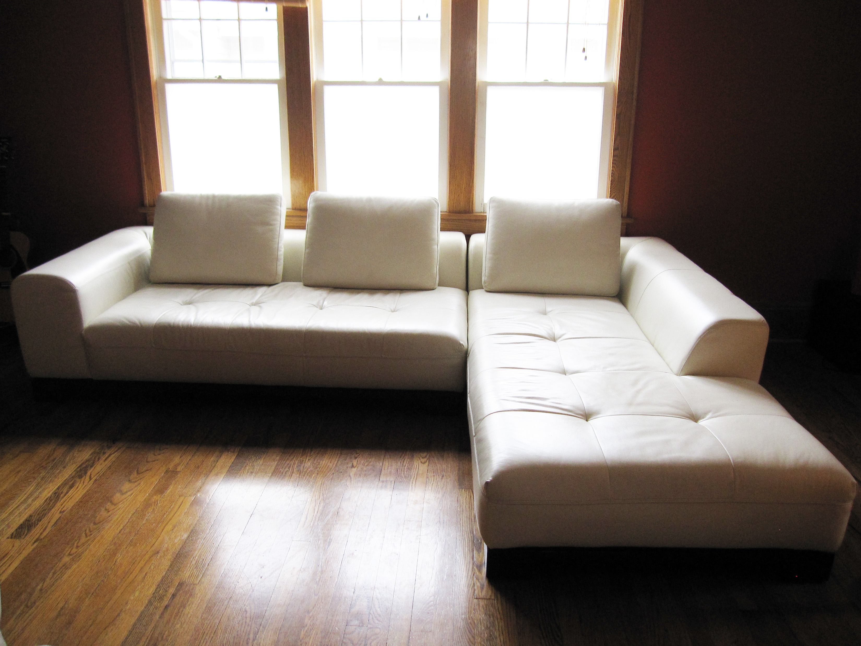 Simple Living With Appealing Simple Living Room Design With White Colored Leather Sleeper Sofa And Light Brown Floor Made From Wooden Material Decoration  Creative Leather Sleeper Sofa With Various And Bewitching Interiors