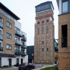 The Water Construction Appealing The Water Tower Residence Construction Displaying Tiled Wall With Wood Glass Windows Completed Outdoor Lamp Dream Homes An Old Water Tower Converted Into A Luminous Modern Home With Sliding Glass Walls