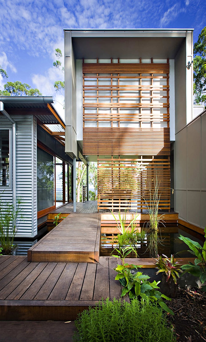 Wooden Accents Road Appealing Wooden Accents Of Storrs Road Residence Applied On Deck And Striped Drapes Beside Small Pool Outside House Decoration Amazing Floating Deck Concept For Luminous Modern House