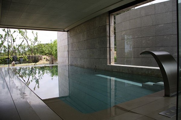 Design Of Pool Astonishing Design Of Stylish Lap Pool Indoor Space With Brick Wall Interior Glass Windows Design Blue Bottom Pool Design Dream Homes Spanish Home Design With Futuristic And Elegant Cantilevered Decorations