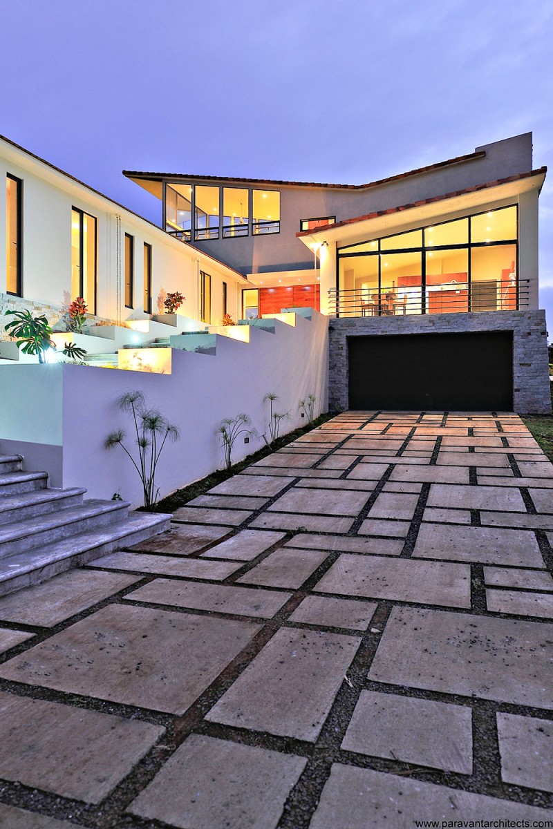 Front Yard Areopagus Astonishing Front Yard Design Of Areopagus Residence With Grey Floor Made From Concrete Blocks And Bright Yellow Lighting From Inside Dream Homes  Stunning Hill House Design With Sophisticated Lighting In Costa Rica