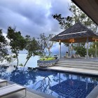 Outdoor Living Of Astounding Outdoor Living Space Design Of Oceanfront Villa Kamala With Several White Colored Bed Chair Which Has Silver Stainless Feet Architecture Luminous Oceanfront Home With Magnificent Natural Views