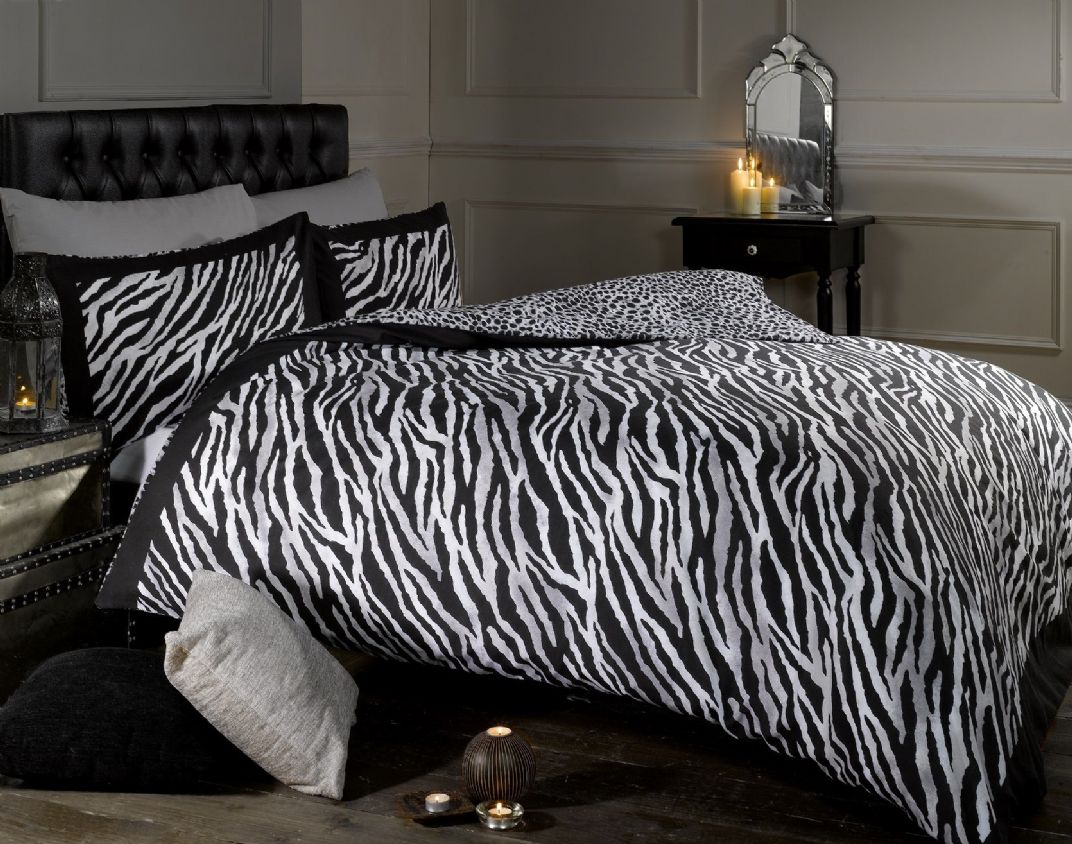 Double Animal Black Attractive Double Animal Print Zebra Black And White Duvet Covers On Black Tufted Headboard With Black Nightstand On Wooden Floor Bedroom  Cozy Black And White Duvet Covers Collection For Comfortable Bedrooms