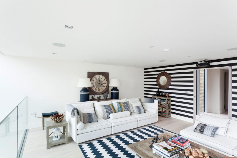 White Black Of Attractive White Black Striped Wall Of The Water Tower Residence Involved White Sofa Coupled With Twin Night Lamp On Table Dream Homes An Old Water Tower Converted Into A Luminous Modern Home With Sliding Glass Walls