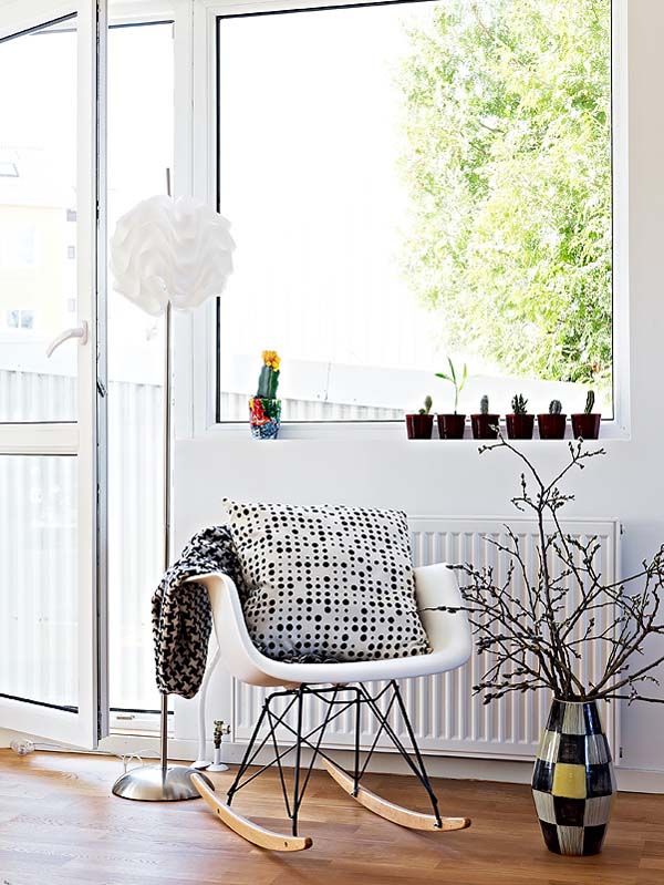 White Wooden Coupled Attractive White Wooden Rocking Chairs Coupled With Dry Plants On Chess Board Patterned Pot In Room With Contemporary Semi Open House Dream Homes Casual Contemporary Home With Stunning Colorful Interior Designs