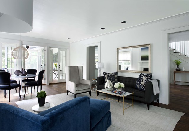 Living Room Sofas Awesome Living Room With Black Sofas Feat Nice Pillows Under The Mirror And Blue Sofas Facing Planter Decor Decoration  Dramatic Yet Elegant Bold Black Sofas For Exquisite Interior Decorations