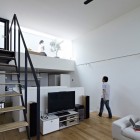 White Open Televisions Awesome White Open Cabinets For Televisions In Dining Room With White Interior Design In Hiyoshi Residence Architecture Beautiful Minimalist Home Decorating In Small Living Spaces