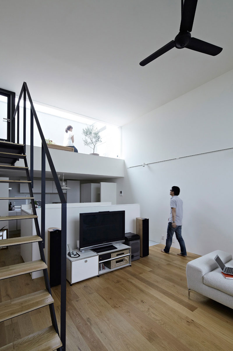 White Open Televisions Awesome White Open Cabinets For Televisions In Dining Room With White Interior Design In Hiyoshi Residence Architecture Beautiful Minimalist Home Decorating In Small Living Spaces