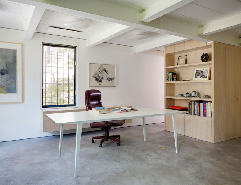 Wooden Shelves Artist Awesome Wooden Shelves In The Artist Residence Home Office With Long White Desk And Brown Swirly Chair Decoration Elegant Home Decorated With Artistic And Contemporary Living Spaces