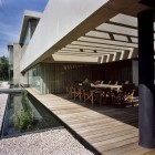 Casa Reforma For Beautiful Casa Reforma Exterior Space For Dining And Gathering Refreshed By Pond With Plantation And Pebbles Dream Homes Creative And Concrete Contemporary Home With Beautiful Large Bookshelf
