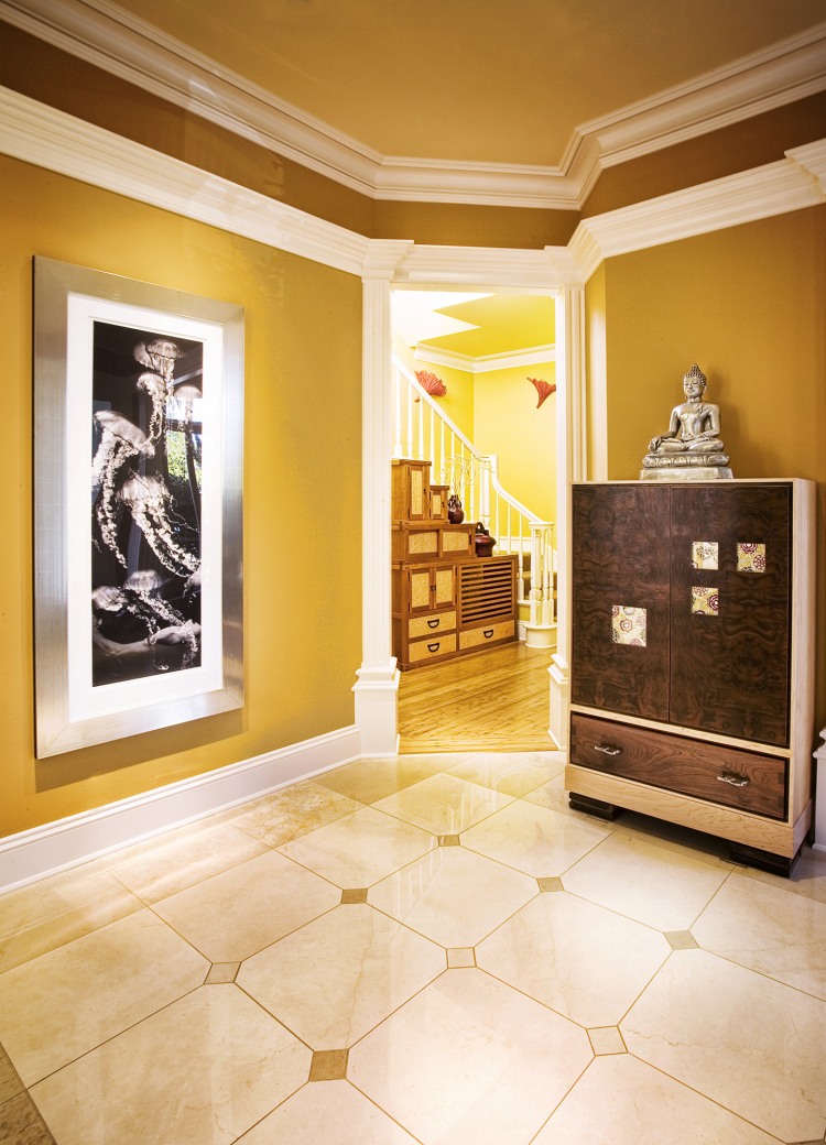 Foyer Decor The Beautiful Foyer Decor Ideas Inside The Modern Residence Applied Tile Floor And Wall Art Also Wooden Storage With Zen Statue Decoration  Wonderful Traditional Interior Design For Unique Modern Residence