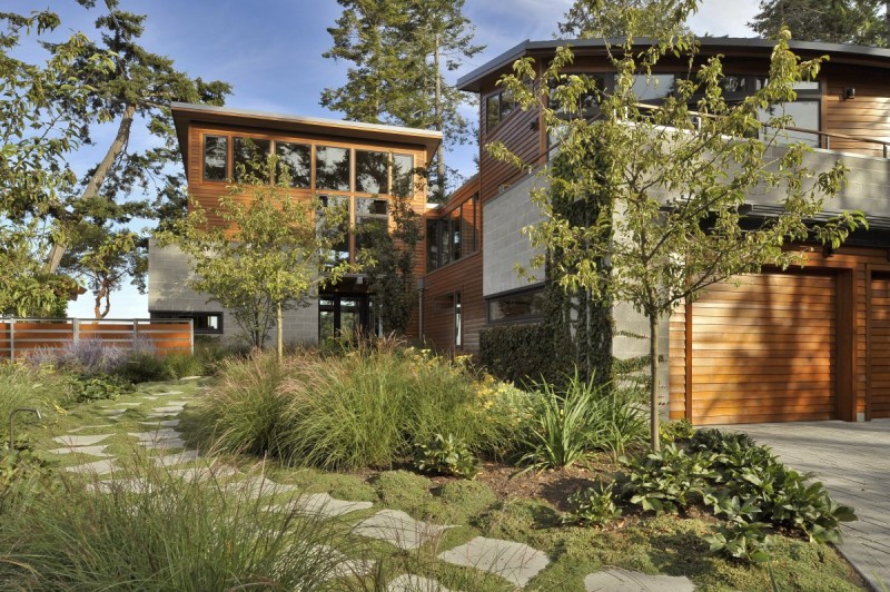 Garden Landscape Stone Beautiful Garden Landscape With Tough Stone Path And Ornamental Plants Horizontal Striped Outdoor Wall Small Glass Window Dream Homes Sustainable Contemporary Home With Wood And Stained Glass Facade