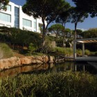 Pond Constructed White Beautiful Pond Constructed Under The White This Is Not A Framed Garden Gazebo Functions As Link Bridge With Cover Dream Homes Elegant Home Covered By Infinity Swimming Pool And Natural Garden View