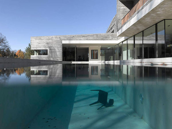 Swimming Pool Backyard Beautiful Swimming Pool In The Backyard Matched With Bare Stone Wall Design And White Concrete Decoration Dream Homes  Beautiful Grey Paint Colors For Your Perfect Contemporary Homes