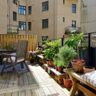 Terrace With At Beautiful Terrace With Small Garden At Swedish Apartment Design Decorated With Some Planters And Chairs Apartments Stylish Swedish Interior Style Apartment With Wooden Furniture Accents