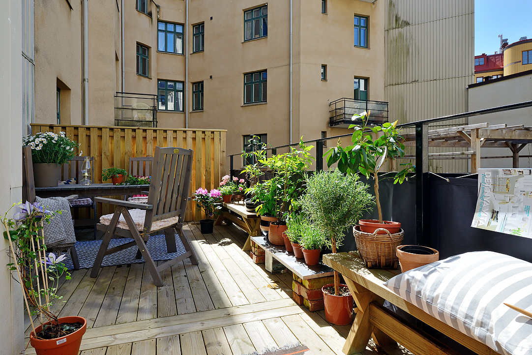 Terrace With At Beautiful Terrace With Small Garden At Swedish Apartment Design Decorated With Some Planters And Chairs Apartments Stylish Swedish Interior Style Apartment With Wooden Furniture Accents