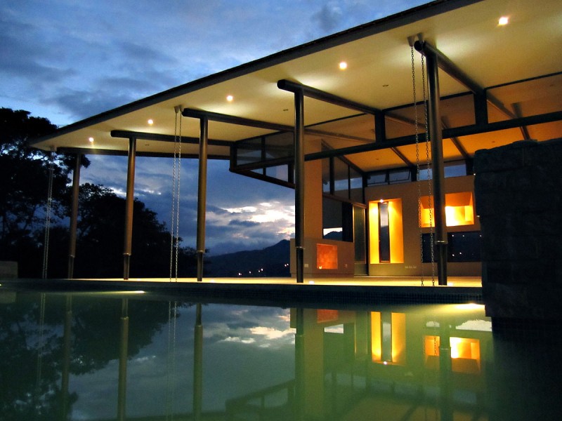 Builing Design Residence Breathtaking Building Design Of Areopagus Residence With White Ceiling Made From Concrete And Several Dark Brown Pillars Made From Wooden Material Dream Homes  Stunning Hill House Design With Sophisticated Lighting In Costa Rica