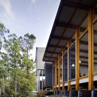 Cool Blue Coupled Breathtaking Cool Blue Skies Atmosphere Coupled With Height Trees Outside Storrs Road Residence Involved Wood Glass Windows Decoration Amazing Floating Deck Concept For Luminous Modern House