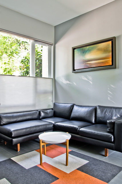 Living Room Black Breathtaking Living Room With Leather Black Sofas Facing White Table That Paint Wall Beside Glass Table Design Decoration  Dramatic Yet Elegant Bold Black Sofas For Exquisite Interior Decorations