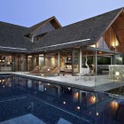 Outdoor Living Of Breathtaking Outdoor Living Space Design Of Oceanfront Villa Kamala With Big Blue Pool And Several Light Brown Colored Bed Chair Made From Wooden Material Architecture Luminous Oceanfront Home With Magnificent Natural Views