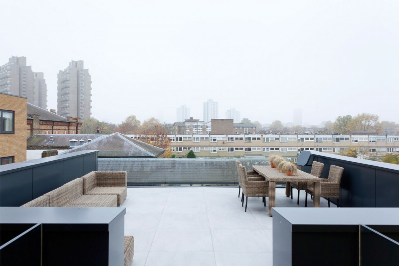 Views Over Tower Breathtaking Views Over The Water Tower Residence Displaying City Building And Cool White Blue Skies Views And Trees Dream Homes  An Old Water Tower Converted Into A Luminous Modern Home With Sliding Glass Walls