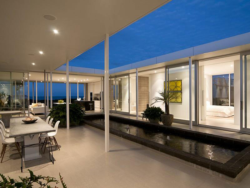 View Of Courtyard Calm View Of Taumata House Courtyard Seen By Evening From Open Semi Outdoor Dining Space With Recessed Lamps Dream Homes Natural Minimalist Home In Contemporary And Beautiful Decorations