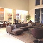 Contemporary Living Light Captivating Contemporary Living Room With Light Brown Colored Leather Sectional Sofa And Circle Shaped Wooden Table Decoration 20 Brilliant Leather Sectional Sofas That Will Fit Stunningly Into Your Family Home