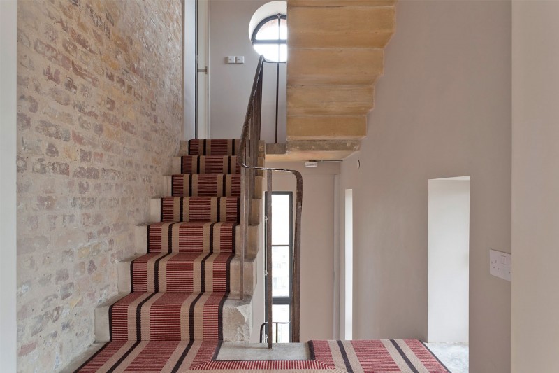 Ladder With And Captivating Ladder With Light Brown And Black Striped Carpet On It Installed Beside Bricks Patterned Wall Of The Water Tower Residence Dream Homes An Old Water Tower Converted Into A Luminous Modern Home With Sliding Glass Walls