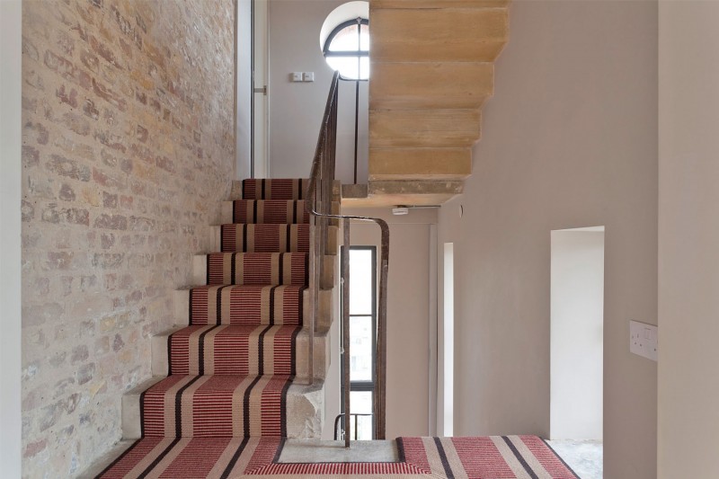 Ladder With And Captivating Ladder With Light Brown And Black Striped Carpet On It Installed Beside Bricks Patterned Wall Of The Water Tower Residence Dream Homes  An Old Water Tower Converted Into A Luminous Modern Home With Sliding Glass Walls