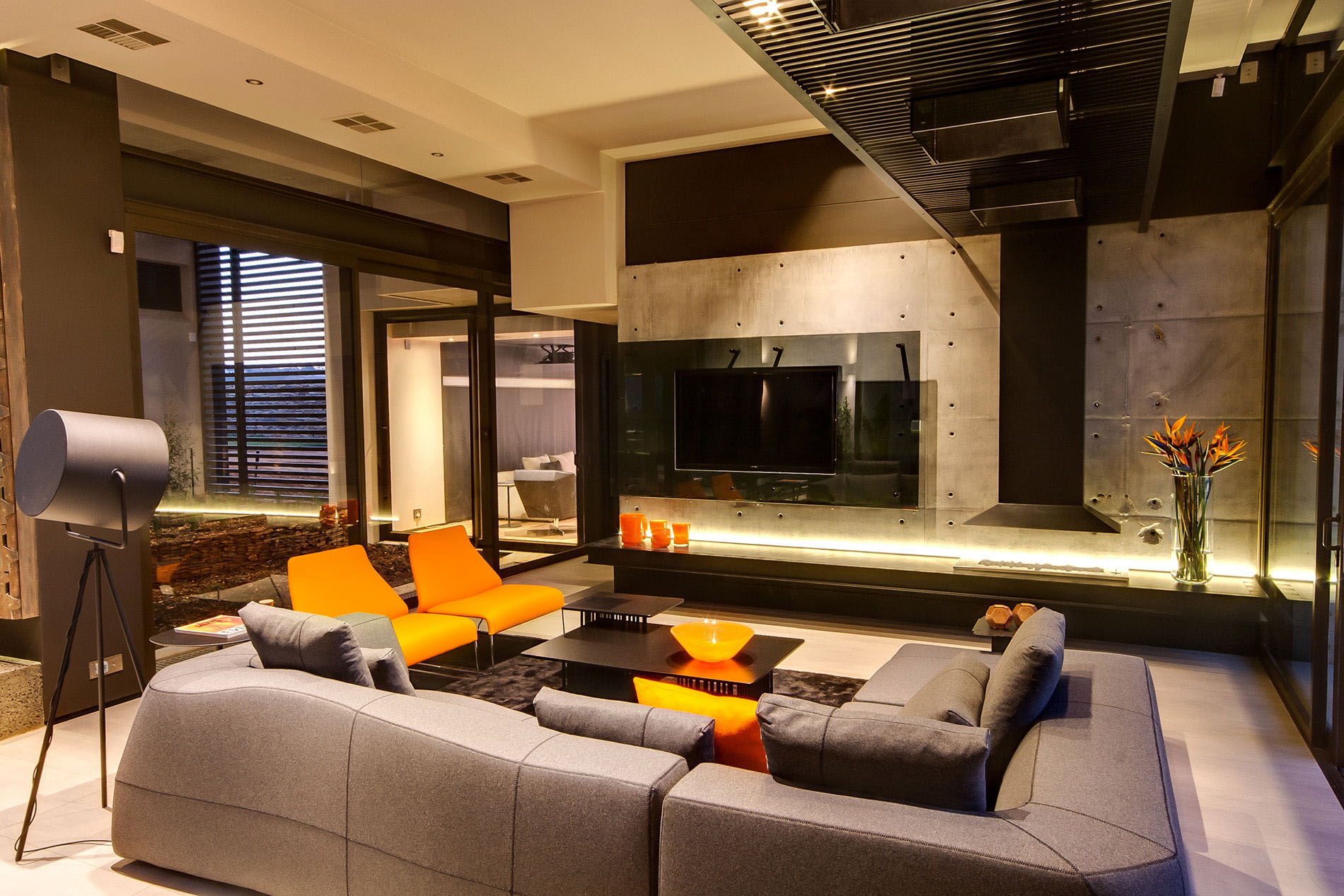 Living Room Of Captivating Living Room Space Design Of House Boz By Nico Van Der Meulen Architects With Wide Black LCD Television Dream Homes Spacious And Concrete Contemporary House With Glass And Steel Elements